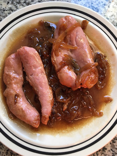 Una foto de Salchichas de pollo al vino