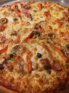 Una foto de Pizza a la parrilla (o al horno)
