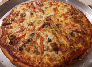 Una foto de Pizza a la parrilla (o al horno)
