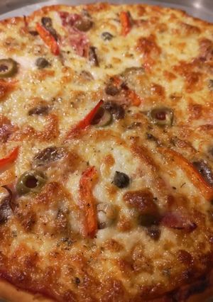 Una foto de Pizza a la parrilla (o al horno)