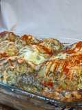 Baked Potatoes with Cheese in the Oven
