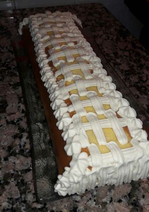 Una foto de Arrollado de crema y chocolate