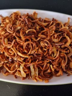A picture of Barista (fried onions) and veg Biriyani.