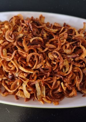 A picture of Barista (fried onions) and veg Biriyani.