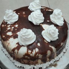 Eggless chocolate mirror glaze cake A picture of Eggless chocolate mirror glaze cake.