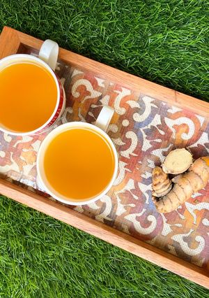 A picture of Fresh Turmeric and Ginger Brew.