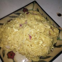 Pineapple Scrabbled Eggs Indomie A picture of Pineapple Scrabbled Eggs Indomie.