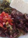 Nyama choma with traditional vegetables and Kachumbari