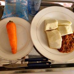 A picture of Boiled yam with carrot sauce.
