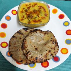 A picture of Healthy & Chatakedar Lili Dungli Ni Kadhi With Bajri Na Rotla.