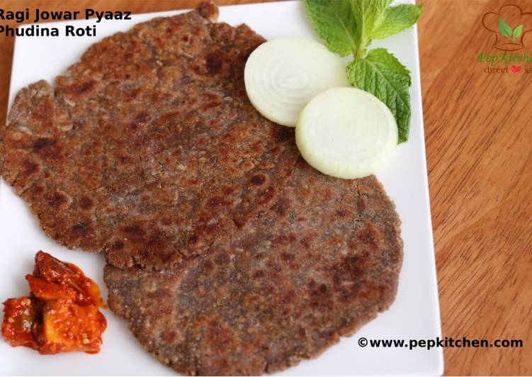 Steps to Make Perfect Ragi Jowar Pyaz Pudina Ki Roti