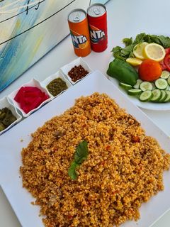 صورة لوصفة برغل بندورة مع اللحمة