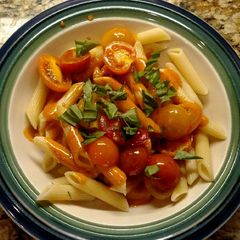 A picture of Chipotle Lime Pasta with Grape Tomatoes.