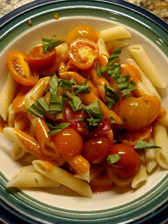 A picture of Chipotle Lime Pasta with Grape Tomatoes.