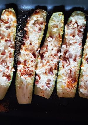Une photo de Courgettes farcies chèvre amandes