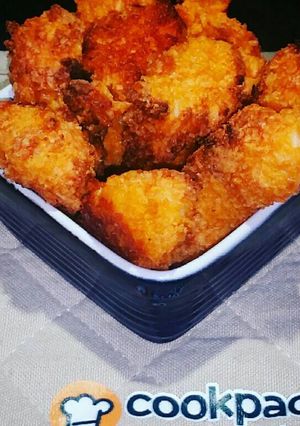 Una foto de Boneless en costra Ruffles