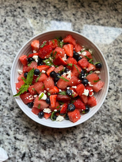 A picture of *Easy* Watermelon strawberry blueberry feta and mint salad.