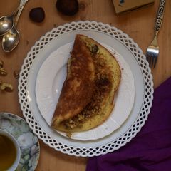 A picture of Murtabak - stuffed pan-fried bread.