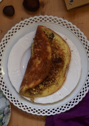 A picture of Murtabak - stuffed pan-fried bread.