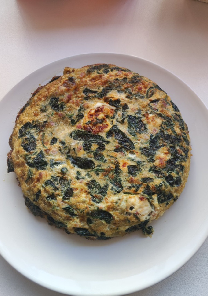 Una foto de Tortilla de espinacas y queso de cabra