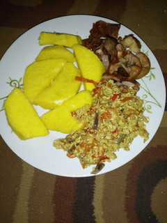 A picture of Yam and Egg sauce with suya.