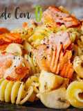 Radiatori con salmón y champiñones