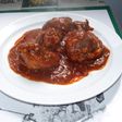 Pollo en salsa de tomate con almendras y nueces