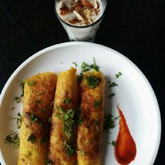 A picture of Veggiee moongdal dosa with Dry fruits and honey oats.