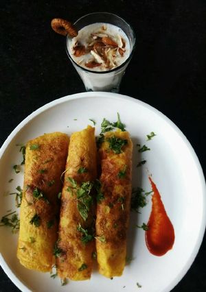 A picture of Veggiee moongdal dosa with Dry fruits and honey oats.