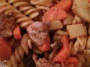 Una foto de fusilli a las especias