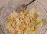Una foto de ensalada de endivias con nueces