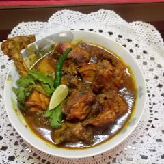 A picture of Chicken curry Bengali style.