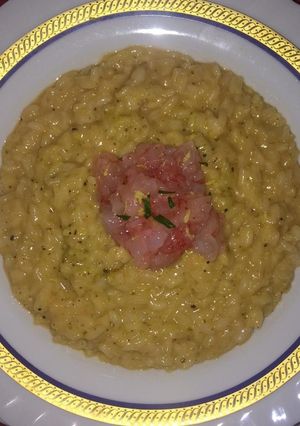 Foto di Risotto al pesto di pistacchi e tartare di gamberi agli agrumi