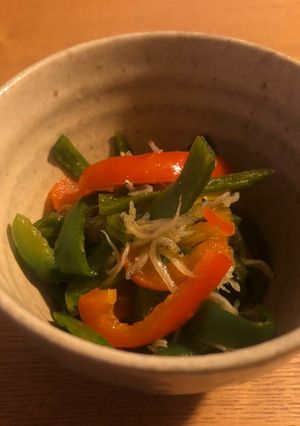 A picture of Stir fried green pepper and jako（dried young sardines）.