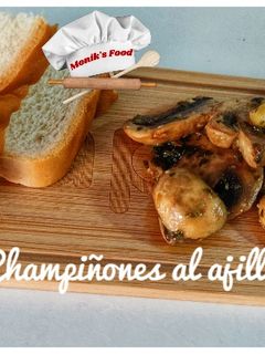 Una foto de 🍄Champiñones al ajillo 🧄
