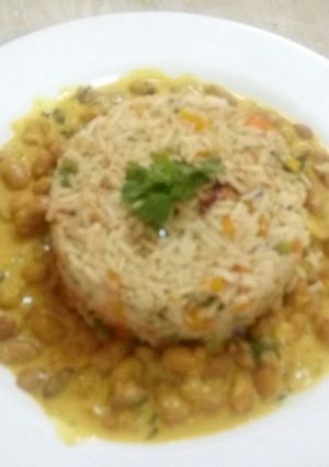 A picture of Vegetable rice with coconut beans.