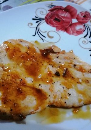 Una foto de Pechuga con salsa de limón y naranja