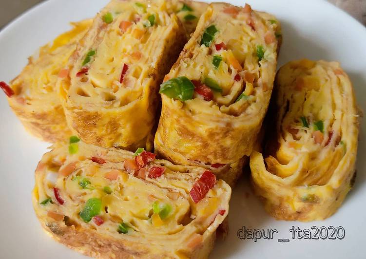cara menggodok Gyeran Mari (Telur Dadar Gulung) yang puas