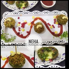 A picture of Spinach corn pea cheese baked balls.
