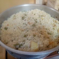 A picture of Peas and potato rice.