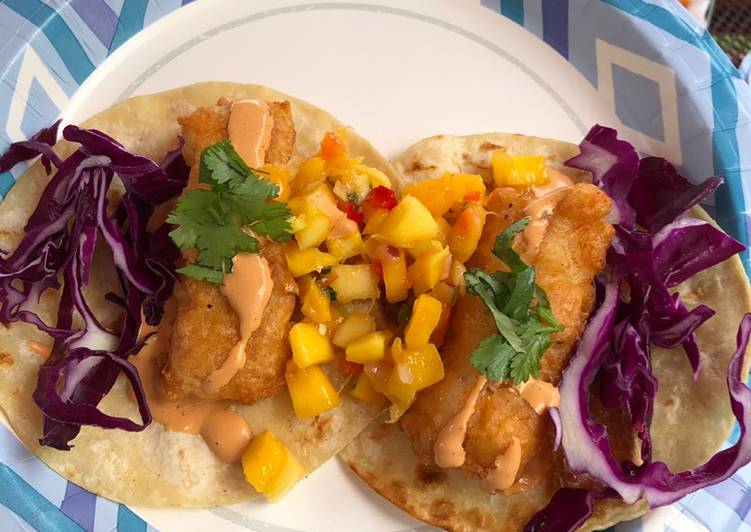Fish Tacos (beer battered cod w/ mango salsa, chipotle mayo, red cabbage, cilantro)