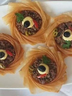 صورة لوصفة صحون ورق ديول المحشية