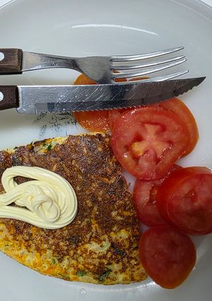 Una foto de Tortilla de arroz y perejil fresco