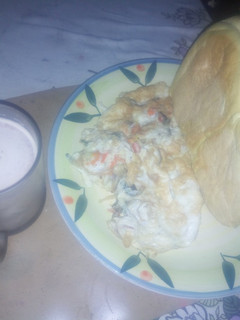 A picture of Bread and egg with beverage.