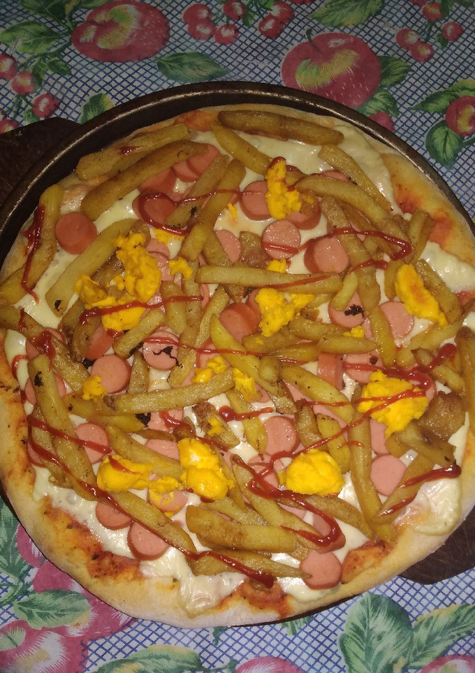 Una foto de Pizza tipo americana