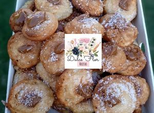 Una foto de Buñuelos al viento rellenos de dulce de leche