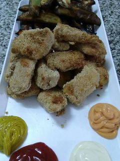 Una foto de Nuggets de pollo rebozados en harina de mandioca