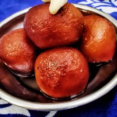 A picture of Kala gulab jamun indian dessert.