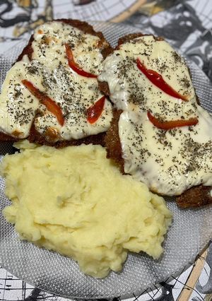 Una foto de Milanesa a la Napolitana Casera