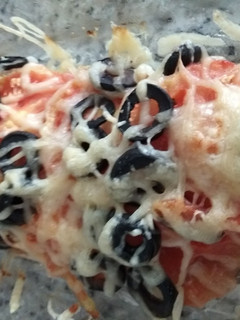 Una foto de 🐟 Merluza con tomate y cebolla